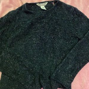 black shiny sweater